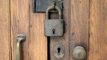 old lock on wood door